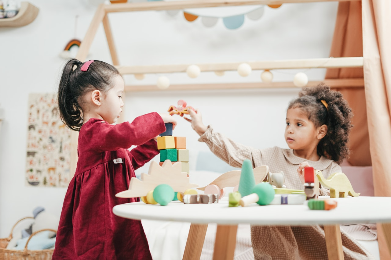 Children playing together in an early years setting