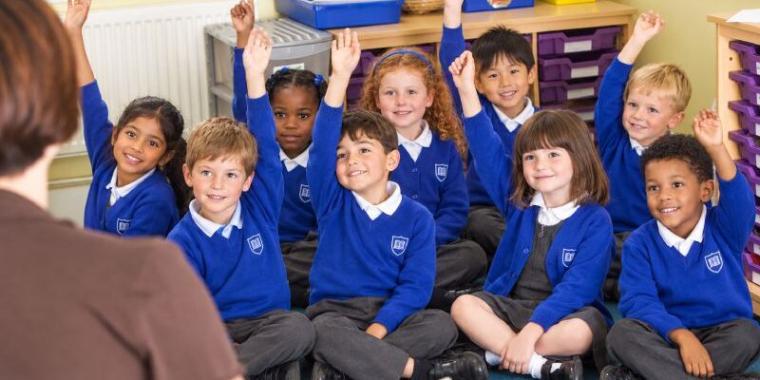 safeguarding-children-in-education-thumbnail2-card-760x380-1 School students listening with their hands up